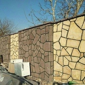 نمای دیوار باغ توسط تیم پیمانکاری سنگ لاشه نادری با اجرای تیشه ای